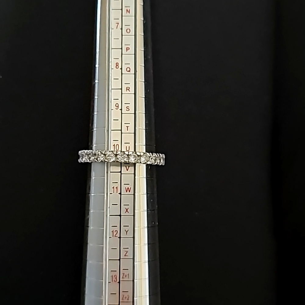 Sterling silver ring with cubic zirconia looking stones infinity band